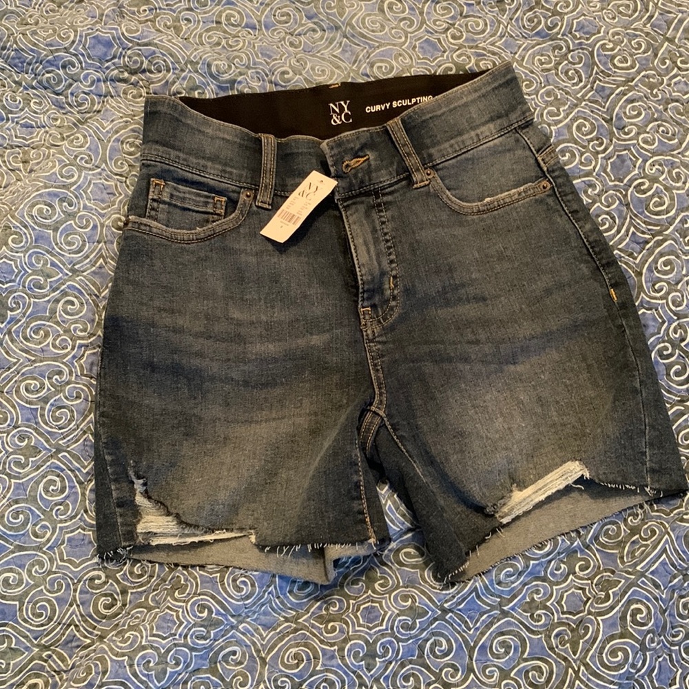 Lightly distressed denim shorts